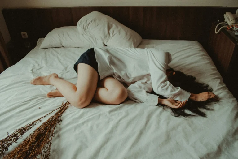 women lying in the bed