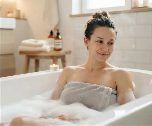Woman relaxing in a warm bath during her period